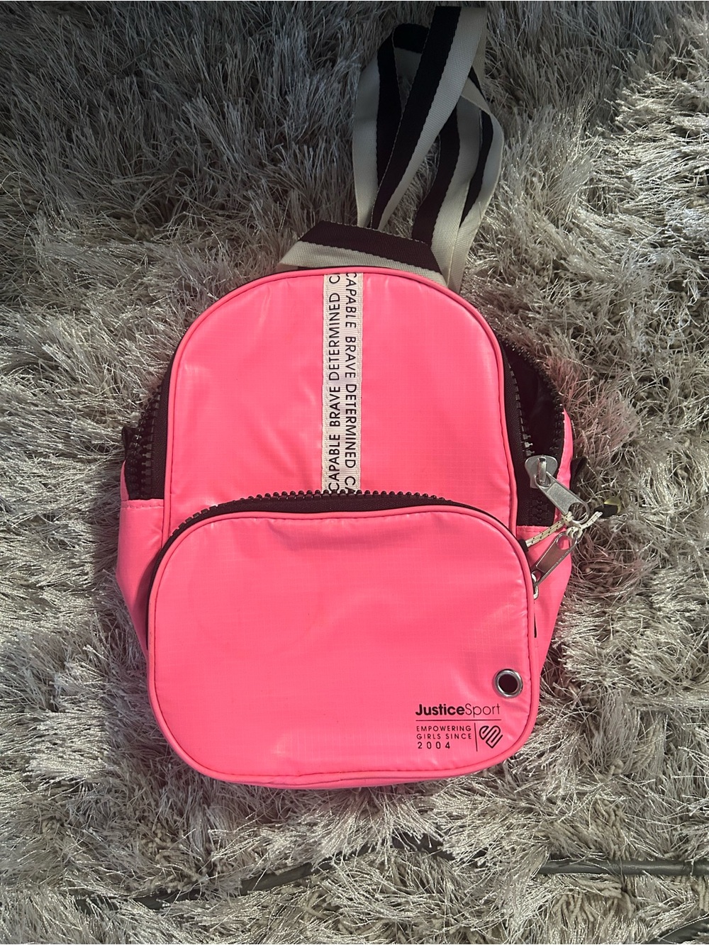 Justice Bright Pink Mini Sling Backpack with Black Accents